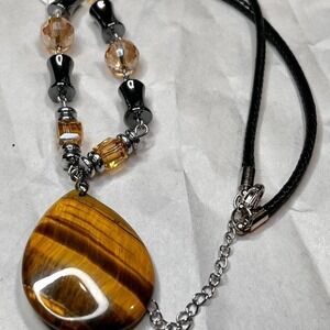 Genuine Tiger eye and crystal necklace with black and gold accents